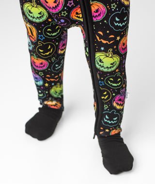 Fold over foot cuffs on bamboo zipper pajamas for babies and toddlers in Halloween Pumpkins print